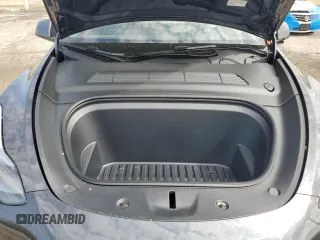 2025 Tesla Model Y Long Range with VIN 7SAYGDED7SF320702, listed as a Copart auction lot 54655325 with 1,169 mi miles and Salvage Title. Bid and sale history available at DreamBid. Image 11.