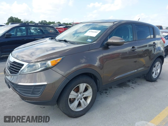 2013 Kia Sportage LX with VIN KNDPB3A28D7375304, listed as a IAAI auction lot 42566081 with 17,890 mi miles and . Bid and sale history available at DreamBid. Image 2.