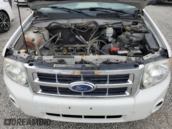2011 Ford Escape XLS with VIN 1FMCU0C71BKB89898, listed as a Copart auction lot 52240445 with 180,201 mi miles and Salvage title. Bid and sale history available at DreamBid. Image 12.