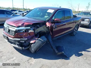 2019 Honda Ridgeline RTL-E with VIN 5FPYK3F72KB024461, listed as a IAAI auction lot 41813568 with 122,364 mi miles. Bid and sale history available at carsss.com. Image 2.