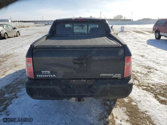 2011 Honda Ridgeline RTL with VIN 5FPYK1F55BB454780, listed as a Copart auction lot 37706554 with 0 mi miles and Salvage Title. Bid and sale history available at carsss.com. Image 6.