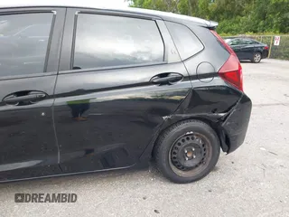 2016 Honda Fit LX with VIN JHMGK5H53GX020149, listed as a IAAI auction lot 42594205 with 183,414 mi miles and . Bid and sale history available at DreamBid. Image 6.