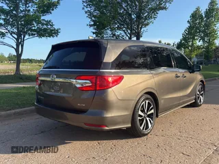 2020 Honda Odyssey Elite with VIN 5FNRL6H99LB004073, listed as a Copart auction lot 54796285 with 167,110 mi miles and Clean Title. Bid and sale history available at DreamBid. Image 4.