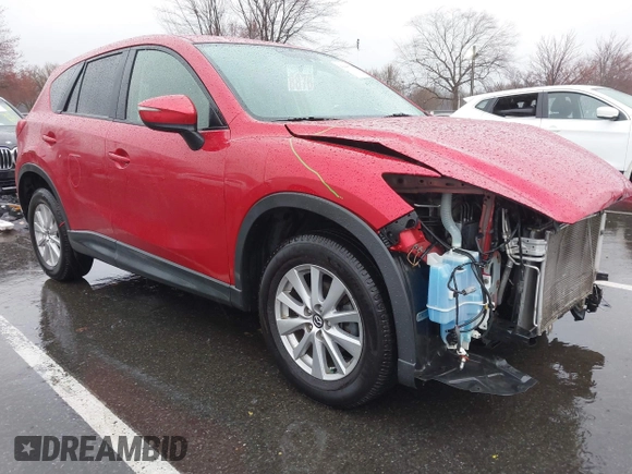 2015 Mazda CX-5 Touring with VIN JM3KE4CY3F0529669, listed as a IAAI auction lot 41866873 with 137,635 mi miles and . Bid and sale history available at carsss.com. Image 1.