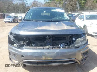 2018 Volkswagen Tiguan SEL with VIN 3VV3B7AX6JM001231, listed as a IAAI auction lot 41781659 with 137,930 mi miles and . Bid and sale history available at DreamBid. Image 6.