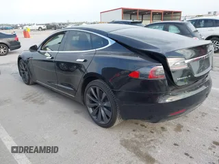 2017 Tesla Model S 100D with VIN 5YJSA1E28HF188981, listed as a IAAI auction lot 42010115 with 76,327 mi miles and . Bid and sale history available at DreamBid. Image 3.