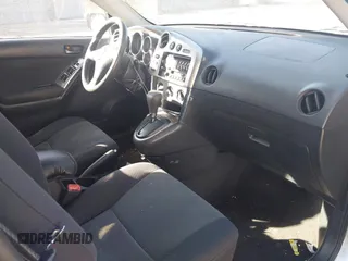 2004 Toyota Matrix Std with VIN 2T1KR32E64C291575, listed as a IAAI auction lot 42095056 with 193,453 mi miles. Bid and sale history available at carsss.com. Image 5.