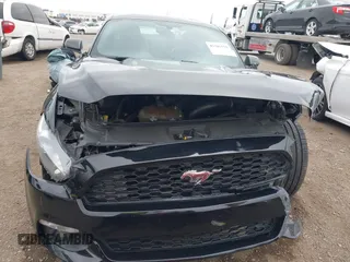 2015 Ford Mustang EcoBoost z VIN 1FA6P8TH6F5370313, wystawiony jako IAAI lot #42206594 z przebiegiem 76 769 mil mil oraz . Historia ofert i sprzedaży dostępna na DreamBid. Obrazek 12.