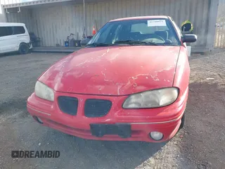 1996 Pontiac Grand Am SE with VIN 1G2NE52T7TC851196, listed as a IAAI auction lot 41700021 with 250,393 mi miles. Bid and sale history available at carsss.com. Image 6.