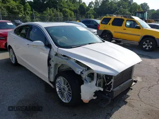 2015 Ford Fusion SE z VIN 3FA6P0H98FR287739, wystawiony jako IAAI lot #42720976 z przebiegiem 107 278 mil mil oraz . Historia ofert i sprzedaży dostępna na DreamBid. Obrazek 1.