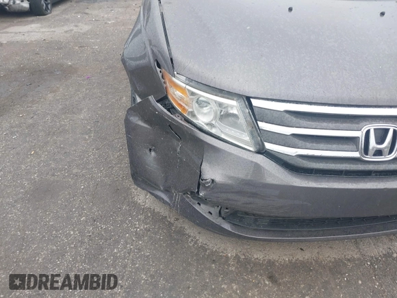 2011 Honda Odyssey EX-L with VIN 5FNRL5H64BB029087, listed as a IAAI auction lot 42508764 with 214,705 mi miles and . Bid and sale history available at DreamBid. Image 6.