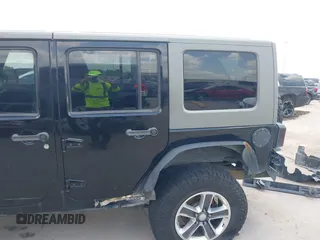 2008 Jeep Wrangler Unlimited Sahara with VIN 1J4GB59198L619802, listed as a IAAI auction lot 42361793 with 272,295 mi miles and . Bid and sale history available at DreamBid. Image 20.