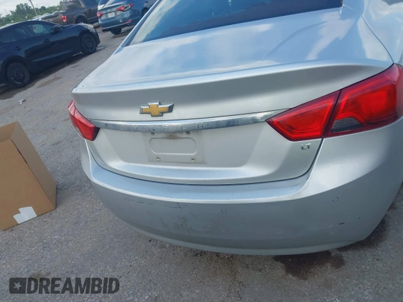 2014 Chevrolet Impala LT with VIN 2G1115SL9E9278164, listed as a IAAI auction lot 42087958 with 242,120 mi miles and . Bid and sale history available at DreamBid. Image 16.