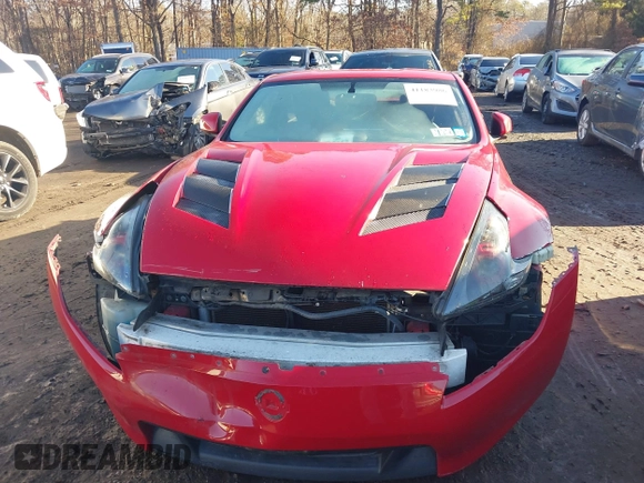2009 Nissan 370Z Touring with VIN JN1AZ44E19M401881, listed as a IAAI auction lot 41183986 with 127,000 mi miles and . Bid and sale history available at DreamBid. Image 12.