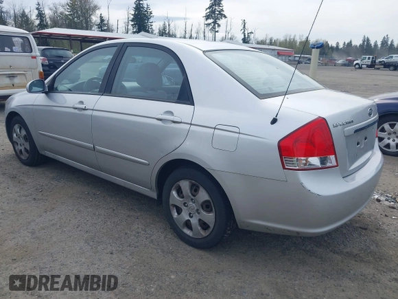 2009 Kia Spectra EX with VIN KNAFE221595659217, listed as a IAAI auction lot 42014406 with 140,527 mi miles. Bid and sale history available at carsss.com. Image 3.