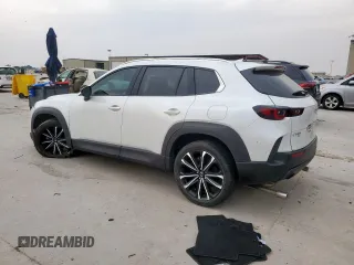 2023 Mazda CX-50 S Premium Plus with VIN 7MMVABEM3PN131818, listed as a Copart auction lot 57358595 with 61,179 mi miles and Clean title. Bid and sale history available at DreamBid. Image 2.