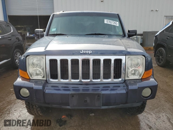 2010 Jeep Commander Sport with VIN 1J4RG4GK5AC119433, listed as a Copart auction lot 87657265 with 212,973 mi miles and Salvage title. Bid and sale history available at DreamBid. Image 5.