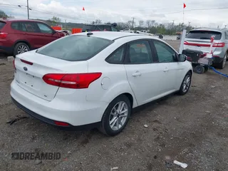 2017 Ford Focus SE with VIN 1FADP3F26HL320298, listed as a IAAI auction lot 41995617 with 128,704 mi miles. Bid and sale history available at carsss.com. Image 4.