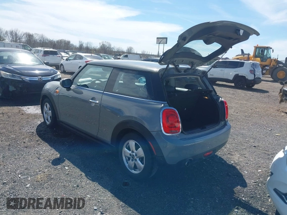 2019 MINI Hardtop Cooper with VIN WMWXP5C55K2H29830, listed as a IAAI auction lot 41808669 with 60,588 mi miles and . Bid and sale history available at DreamBid. Image 3.