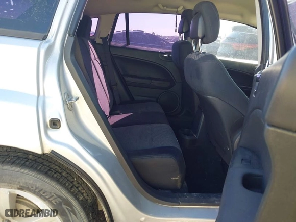 2010 Dodge Caliber SXT with VIN 1B3CB4HA4AD619143, listed as a IAAI auction lot 41694631 with 172,657 mi miles. Bid and sale history available at carsss.com. Image 8.