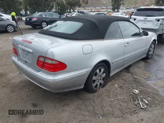 2001 Mercedes-Benz CLK 320/430 with VIN WDBLK65G71T075969, listed as a IAAI auction lot 42103313 with 172,182 mi miles and . Bid and sale history available at DreamBid. Image 4.
