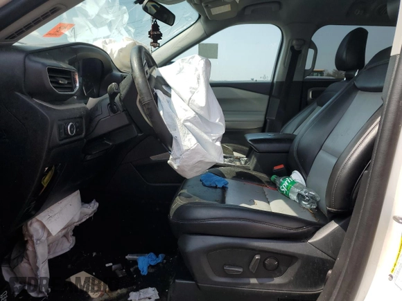 2023 Ford Explorer XLT with VIN 1FMSK8DH3PGB32460, listed as a Copart auction lot 61138545 with 49,434 mi miles and Salvage title. Bid and sale history available at DreamBid. Image 7.