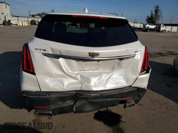 2022 Cadillac XT5 FWD Luxury z VIN 1GYKNAR49NZ118633, wystawiony jako Copart lot #43274175 z przebiegiem 46 946 mil mil oraz Szkoda całkowita • Salvage title. Historia ofert i sprzedaży dostępna na DreamBid. Obrazek 6.