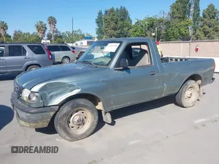 2003 Mazda B-Series Truck SX z VIN 4F4YR12D73TM00856, wystawiony jako IAAI lot #42262448 z przebiegiem 77 658 mil mil oraz . Historia ofert i sprzedaży dostępna na DreamBid. Obrazek 2.