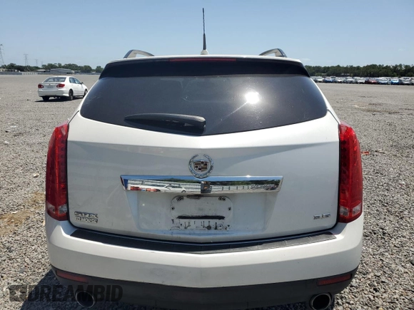 2014 Cadillac SRX z VIN 3GYFNAE32ES543932, wystawiony jako Copart lot #54256435 z przebiegiem 169 621 mil mil oraz Szkoda całkowita • Salvage title. Historia ofert i sprzedaży dostępna na DreamBid. Obrazek 6.