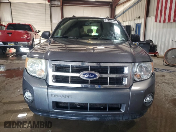 2012 Ford Escape XLT z VIN 1FMCU9DG8CKA93402, wystawiony jako Copart lot #62266845 z przebiegiem 196 779 mil mil oraz Szkoda całkowita • Salvage title. Historia ofert i sprzedaży dostępna na DreamBid. Obrazek 5.