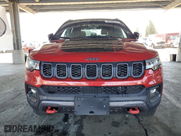 2025 Jeep Compass Trailhawk with VIN 3C4NJDDNXST553759, listed as a Copart auction lot 64247685 with 9,314 mi miles and Salvage title. Bid and sale history available at DreamBid. Image 5.