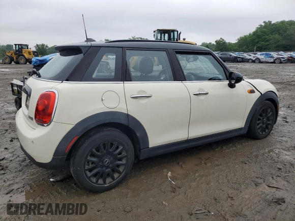 2017 MINI Hardtop 4 Door Cooper with VIN WMWXU1C53H2E18584, listed as a Copart auction lot 61355915 with 56,171 mi miles and Salvage title. Bid and sale history available at DreamBid. Image 3.