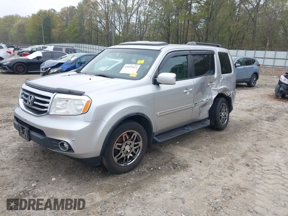 2014 Honda Pilot Touring with VIN 5FNYF4H91EB011934, listed as a IAAI auction lot 41929415 with 227,343 mi miles and . Bid and sale history available at DreamBid. Image 17.