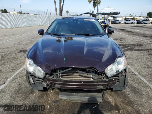 2011 Jaguar XF Premium with VIN SAJWA0GB1BLS08325, listed as a Copart auction lot 61190335 with 61,656 mi miles and Salvage title. Bid and sale history available at DreamBid. Image 5.