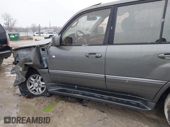 2000 Lexus LX 470 z VIN JT6HT00W8Y0092556, wystawiony jako IAAI lot #41727615 z przebiegiem 156 262 mil mil oraz . Historia ofert i sprzedaży dostępna na DreamBid. Obrazek 14.