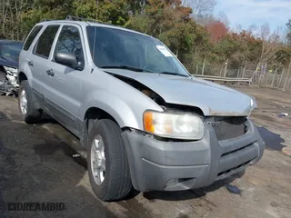 2004 Ford Escape XLT with VIN 1FMYU03184KB74819, listed as a IAAI auction lot 41838482 with 223,651 mi miles. Bid and sale history available at carsss.com. Image 1.