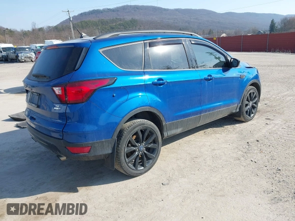 2019 Ford Escape SE with VIN 1FMCU9GD7KUB44070, listed as a IAAI auction lot 41801706 with 77,612 mi miles. Bid and sale history available at carsss.com. Image 4.