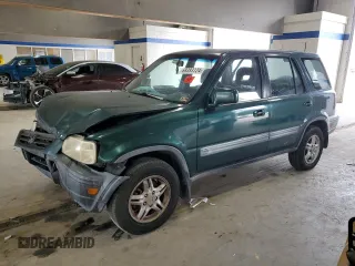2000 Honda CR-V EX with VIN JHLRD1863YC017642, listed as a Copart auction lot 69393124 with 228,627 mi miles and Salvage Title. Bid and sale history available at carsss.com. Image 1.