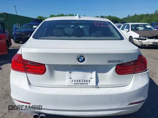2014 BMW 3 Series 328i with VIN WBA3A5C58EF605108, listed as a IAAI auction lot 42129770 with 169,924 mi miles and . Bid and sale history available at DreamBid. Image 16.