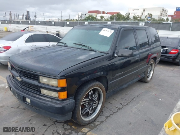2000 Chevrolet Tahoe Limited with VIN 1GNEC13R7YR151624, listed as a IAAI auction lot 41785878 with 227,576 mi miles. Bid and sale history available at carsss.com. Image 2.