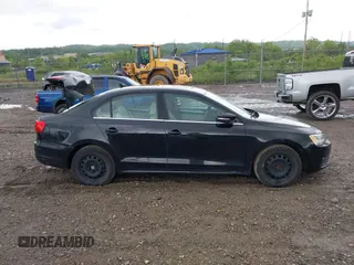 2013 Volkswagen Jetta SE z VIN 3VWDP7AJXDM289031, wystawiony jako IAAI lot #42325596 z przebiegiem 157 774 mil mil oraz . Historia ofert i sprzedaży dostępna na DreamBid. Obrazek 13.