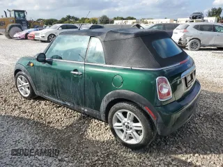 2015 MINI Convertible z VIN WMWZN3C5XFT861708, wystawiony jako Copart lot #82233054 z przebiegiem 38 498 mil mil oraz Czysty tytuł • Clean title. Historia ofert i sprzedaży dostępna na DreamBid. Obrazek 2.