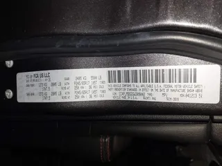 2016 Jeep Cherokee Trailhawk with VIN 1C4PJMBS2GW309042, listed as a IAAI auction lot 41564925 with 125,436 mi miles. Bid and sale history available at carsss.com. Image 9.