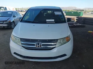 2012 Honda Odyssey EX-L with VIN 5FNRL5H67CB051764, listed as a IAAI auction lot 42493181 with 167,189 mi miles and . Bid and sale history available at DreamBid. Image 6.