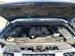 2006 Nissan Titan SE z VIN 1N6BA06B86N511768, wystawiony jako Copart lot #52146585 z przebiegiem 174 058 mil mil oraz Szkoda całkowita • Salvage title. Historia ofert i sprzedaży dostępna na DreamBid. Obrazek 11.