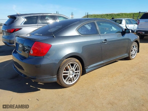2007 Scion tC Spec with VIN JTKDE167870158165, listed as a IAAI auction lot 41703293 with 136610 miles. Bid and sale history available at carsss.com. Image 4.