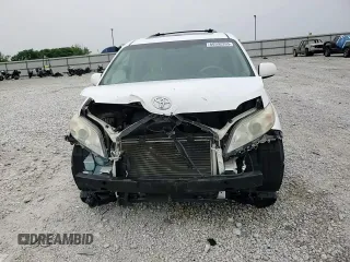 2012 Toyota Sienna XLE AAS с VIN 5TDYK3DC7CS207716, выставлен на аукционе Copart как лот 60592265 с пробегом 287 021 миль миль и Списание • Salvage title. История ставок и продаж доступна на DreamBid. Изображение 15.