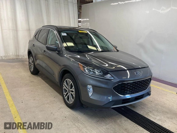 2021 Ford Escape SEL Hybrid z VIN 1FMCU9CZ7MUA83422, wystawiony jako IAAI lot #42743365 z przebiegiem 70 851 mil mil oraz . Historia ofert i sprzedaży dostępna na DreamBid. Obrazek 16.