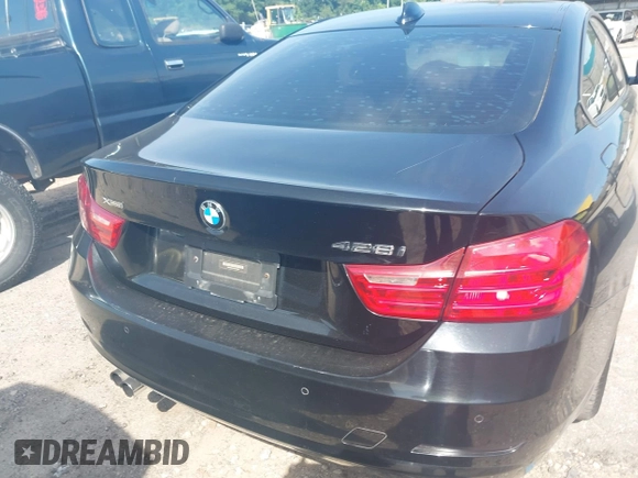 2014 BMW 4 Series 428i xDrive with VIN WBA3N5C52EF716998, listed as a IAAI auction lot 42548467 with 212,418 mi miles and . Bid and sale history available at DreamBid. Image 16.