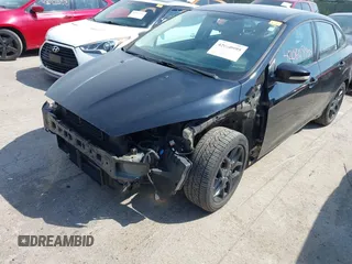 2016 Ford Focus SE with VIN 1FADP3FE6GL335943, listed as a IAAI auction lot 42060995 with 115,701 mi miles. Bid and sale history available at carsss.com. Image 6.